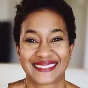 headshot photo of Natalie Walrond smiling